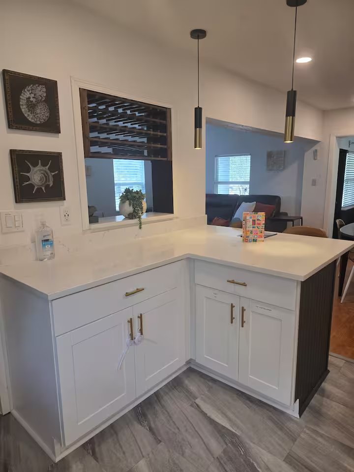 Kitchen breakfast bar with pendant lighting