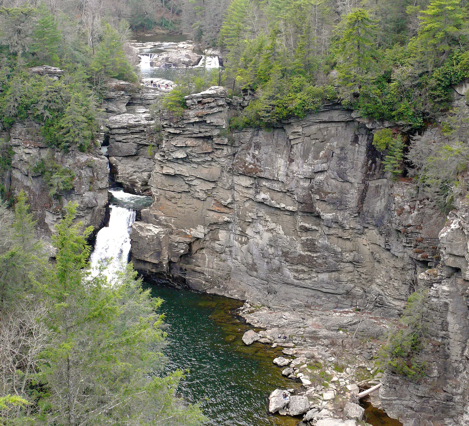 Linville Falls cascading through a rocky gorge in North Carolina, viewed from an overlook