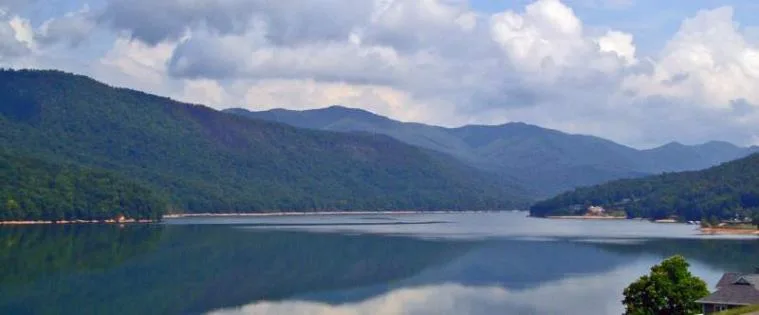 Watauga Lake surrounded by forested Appalachian mountains